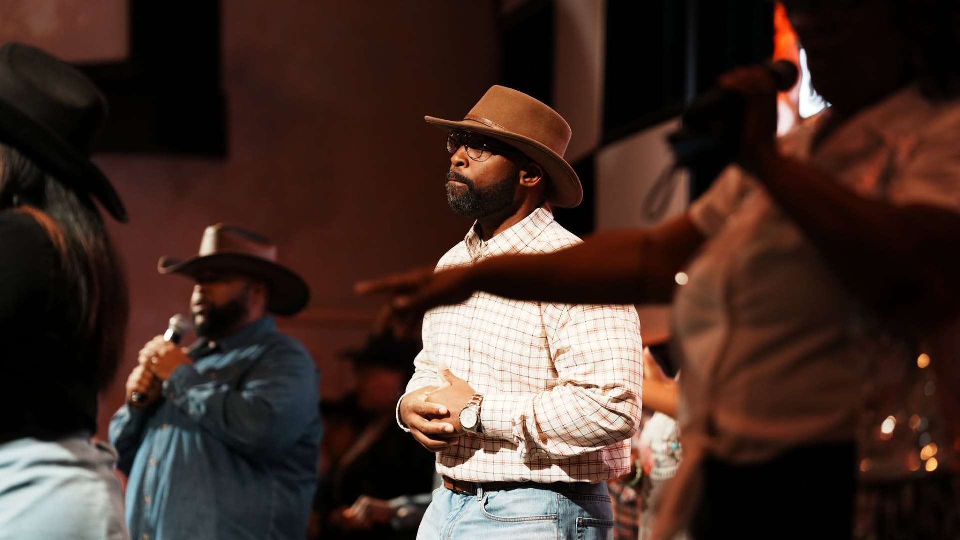 Men worshipping together